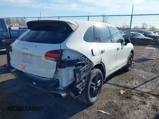 2016 Porsche Cayenne with VIN WP1AA2A20GKA36068, listed as a IAAI auction lot 41828945 with 86,938 mi miles. Bid and sale history available at carsss.com. Image 4.