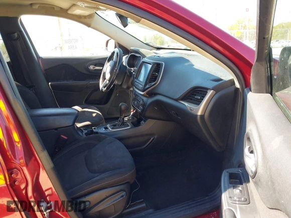 2015 Jeep Cherokee North with VIN 1C4PJMCSXFW654090, listed as a IAAI auction lot 41844434 with 198,592 mi miles. Bid and sale history available at carsss.com. Image 5.