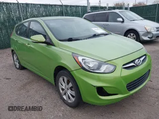 2013 Hyundai Accent SE with VIN KMHCU5AEXDU069586, listed as a IAAI auction lot 40968974 with 98,939 mi miles. Bid and sale history available at carsss.com. Image 1.