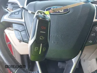 2015 Ford Edge Titanium z VIN 2FMTK3K97FBB06890, wystawiony jako IAAI lot #42241919 z przebiegiem 179 181 mil mil oraz . Historia ofert i sprzedaży dostępna na DreamBid. Obrazek 11.