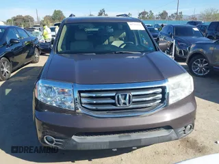 2015 Honda Pilot Touring with VIN 5FNYF3H94FB002236, listed as a IAAI auction lot 41735221 with 112,766 mi miles. Bid and sale history available at carsss.com. Image 12.