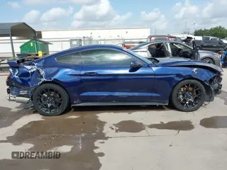 2018 Ford Mustang EcoBoost z VIN 1FA6P8TH0J5104312, wystawiony jako IAAI lot #42532806 z przebiegiem 87 564 mil mil oraz . Historia ofert i sprzedaży dostępna na DreamBid. Obrazek 14.