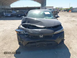2022 Honda Civic LX z VIN 2HGFE2F20NH573453, wystawiony jako IAAI lot #41854126 z przebiegiem 34 289 mil mil oraz . Historia ofert i sprzedaży dostępna na DreamBid. Obrazek 12.
