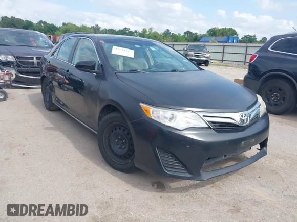 2014 Toyota Camry L with VIN 4T1BF1FK8EU468379, listed as a IAAI auction lot 42134387 with 101,603 mi miles and . Bid and sale history available at DreamBid. Image 1.