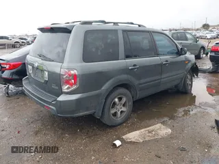 2007 Honda Pilot EX-L with VIN 5FNYF18697B002843, listed as a IAAI auction lot 41549328 with 202,365 mi miles and . Bid and sale history available at DreamBid. Image 4.