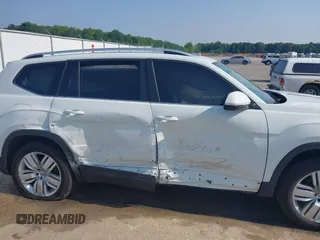 2019 Volkswagen Atlas SE with VIN 1V2UR2CA6KC549094, listed as a IAAI auction lot 42385802 with 61,718 mi miles and . Bid and sale history available at DreamBid. Image 6.