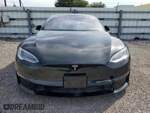 2022 Tesla Model S Plaid z VIN 5YJSA1E64NF461218, wystawiony jako Copart lot #84467644 z przebiegiem Nie podano mil oraz Szkoda całkowita • Salvage title. Historia ofert i sprzedaży dostępna na DreamBid. Obrazek 5.