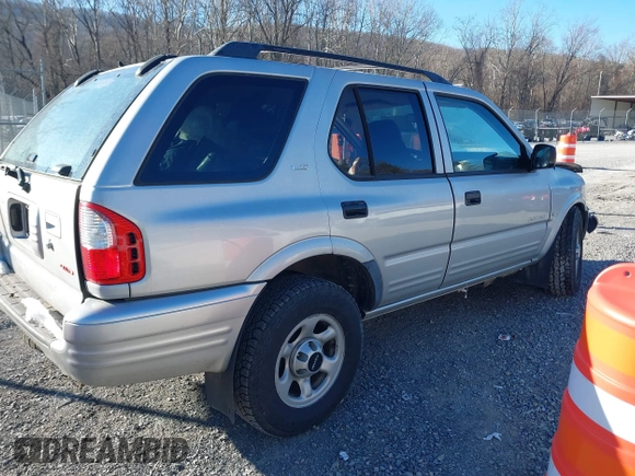 2001 Isuzu Rodeo S with VIN 4S2DM58W414351245, listed as a IAAI auction lot 41339632 with 149,543 mi miles and . Bid and sale history available at DreamBid. Image 4.