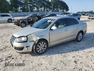 2010 Volkswagen Jetta SE с VIN 3VWRX7AJ1AM048637, выставлен на аукционе Copart как лот 57045965 с пробегом 158 297 миль миль и Списание • Salvage title. История ставок и продаж доступна на DreamBid. Изображение 1.