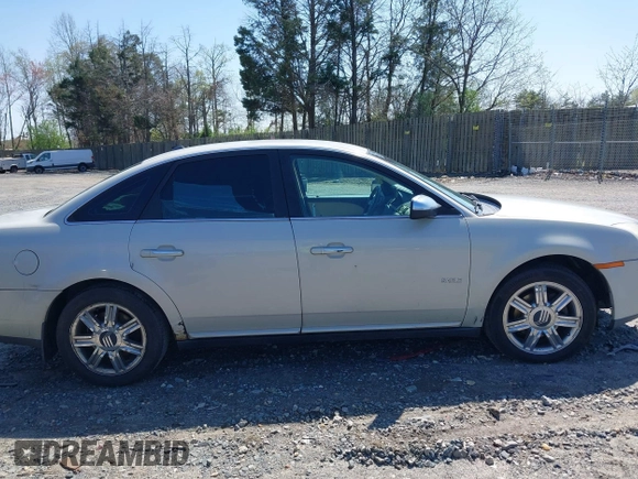 2008 Mercury Sable Premier z VIN 1MEHM42W28G613576, wystawiony jako IAAI lot #41900783 z przebiegiem 176 028 mil mil oraz . Historia ofert i sprzedaży dostępna na DreamBid. Obrazek 13.