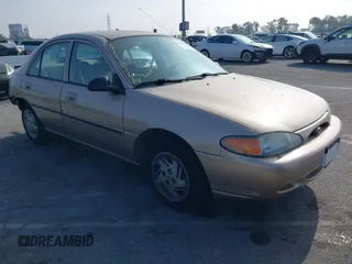 1999 Ford Escort LX with VIN 1FAFP10P3XW138847, listed as a IAAI auction lot 41216936 with 62,672 mi miles. Bid and sale history available at carsss.com. Image 1.