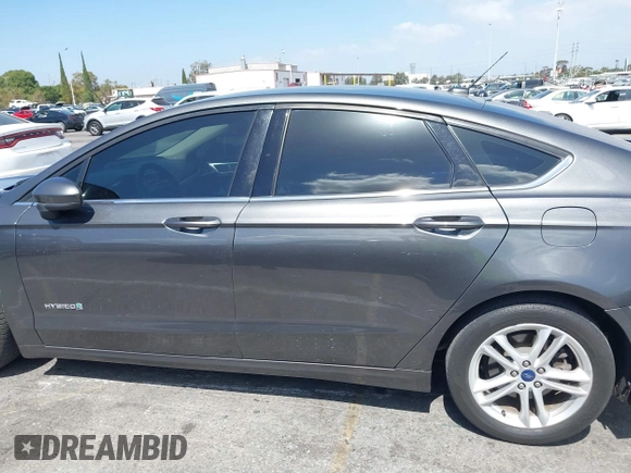 2018 Ford Fusion Hybrid SE with VIN 3FA6P0LU4JR261594, listed as a IAAI auction lot 40360797 with 128,533 mi miles. Bid and sale history available at carsss.com. Image 14.