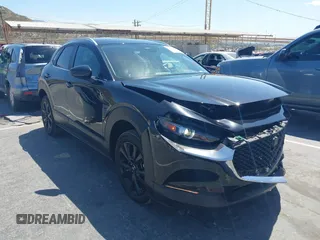 2024 Mazda CX-30 S Select Sport with VIN 3MVDMBBM9RM706894, listed as a IAAI auction lot 42259451 with 7,071 mi miles and . Bid and sale history available at DreamBid. Image 1.