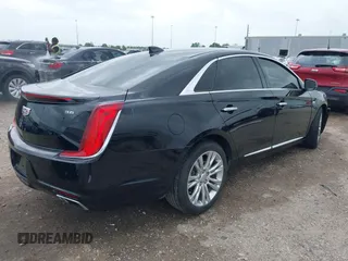 2019 Cadillac XTS Luxury with VIN 2G61M5S38K9155257, listed as a IAAI auction lot 41946771 with 41,062 mi miles and . Bid and sale history available at DreamBid. Image 4.