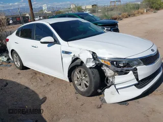 2016 Kia Optima LX with VIN 5XXGT4L37GG052141, listed as a IAAI auction lot 42421838 with 57,579 mi miles and . Bid and sale history available at DreamBid. Image 1.