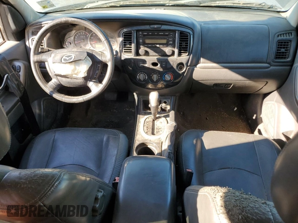 2006 Mazda Tribute S with VIN 4F2YZ06136KM31485, listed as a Copart auction lot 75412344 with Not Provided miles and Salvage Title. Bid and sale history available at DreamBid. Image 8.