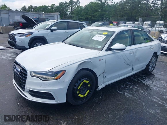 2014 Audi A6 Prestige with VIN WAUHGAFCXEN091050, listed as a IAAI auction lot 42524560 with 169,575 mi miles and . Bid and sale history available at DreamBid. Image 2.