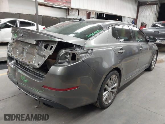 2015 Kia Optima SX Turbo with VIN 5XXGR4A6XFG469733, listed as a IAAI auction lot 42494569 with 145,397 mi miles and . Bid and sale history available at DreamBid. Image 4.