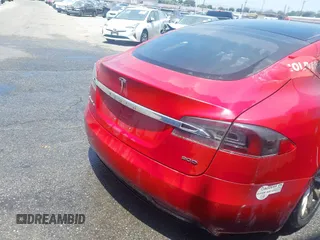 2016 Tesla Model S 90D with VIN 5YJSA1E23GF157488, listed as a IAAI auction lot 38049947 with Not provided miles and . Bid and sale history available at DreamBid. Image 4.