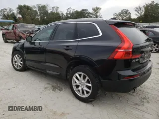 2018 Volvo XC60 Momentum with VIN LYV102RK1JB073418, listed as a Copart auction lot 73763614 with 64,692 mi miles and Salvage Title. Bid and sale history available at DreamBid. Image 2.