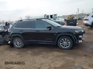 2022 Jeep Cherokee Latitude Lux z VIN 1C4PJLMX3ND510914, wystawiony jako IAAI lot #41824087 z przebiegiem 80 515 mil mil oraz . Historia ofert i sprzedaży dostępna na DreamBid. Obrazek 14.