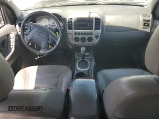 2007 Ford Escape Hybrid with VIN 1FMCU49H87KB61613, listed as a Copart auction lot 58083235 with 129,049 mi miles and Salvage title. Bid and sale history available at DreamBid. Image 8.