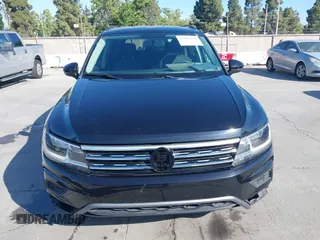 2018 Volkswagen Tiguan S with VIN 3VV1B7AX1JM091928, listed as a IAAI auction lot 42283454 with 53,650 mi miles and . Bid and sale history available at DreamBid. Image 12.
