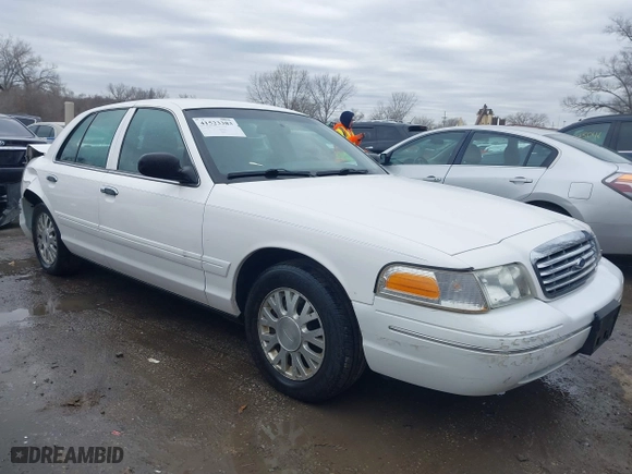 2005 Ford Crown Victoria LX with VIN 2FAFP74WX5X105415, listed as a IAAI auction lot 41523383 with 119,222 mi miles. Bid and sale history available at carsss.com. Image 13.