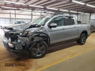 2022 Honda Ridgeline RTL-E z VIN 5FPYK3F73NB008273, wystawiony jako Copart lot #53916165 z przebiegiem 30 962 mil mil oraz Szkoda całkowita • Salvage title. Historia ofert i sprzedaży dostępna na DreamBid. Obrazek 1.