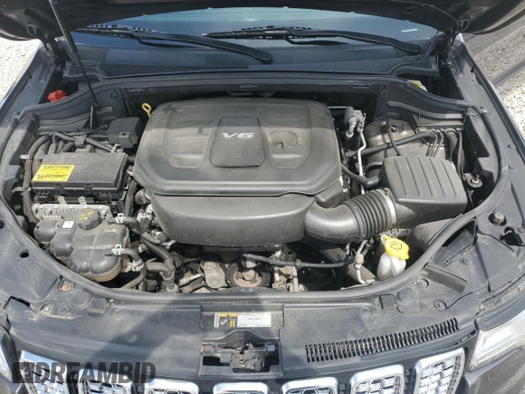 2017 Jeep Grand Cherokee Overland z VIN 1C4RJFCG1HC684826, wystawiony jako Copart lot #59971595 z przebiegiem 101 765 mil mil oraz Szkoda całkowita • Salvage title. Historia ofert i sprzedaży dostępna na DreamBid. Obrazek 12.