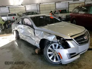 2015 Cadillac ATS Luxury AWD z VIN 1G6AH1RX4F0113934, wystawiony jako Copart lot #84439094 z przebiegiem 56 679 mil mil oraz Szkoda całkowita • Salvage title. Historia ofert i sprzedaży dostępna na DreamBid. Obrazek 13.