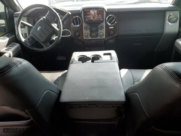 2015 Ford Super Duty F-250 SRW Lariat with VIN 1FT7W2BT8FEC77457, listed as a Copart auction lot 47031295 with 140,856 mi miles and Salvage Title. Bid and sale history available at carsss.com. Image 8.