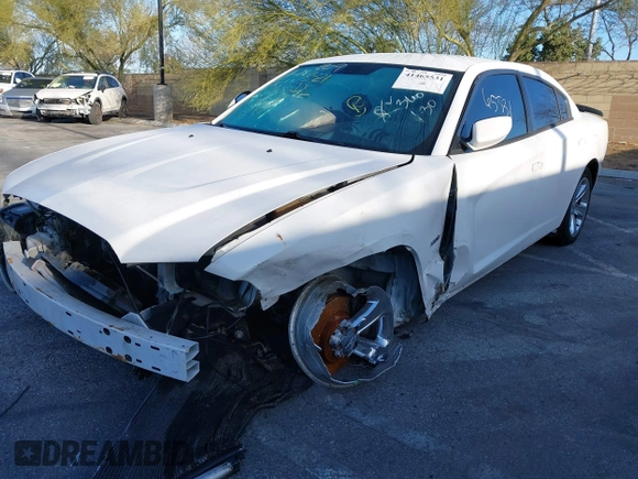 2012 Dodge Charger RT Plus with VIN 2C3CDXCT2CH302202, listed as a IAAI auction lot 41465531 with 166,705 mi miles and . Bid and sale history available at DreamBid. Image 2.