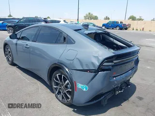 2024 Toyota Prius SE z VIN JTDACACU1R3033326, wystawiony jako IAAI lot #42174204 z przebiegiem 11 273 mil mil oraz . Historia ofert i sprzedaży dostępna na DreamBid. Obrazek 3.