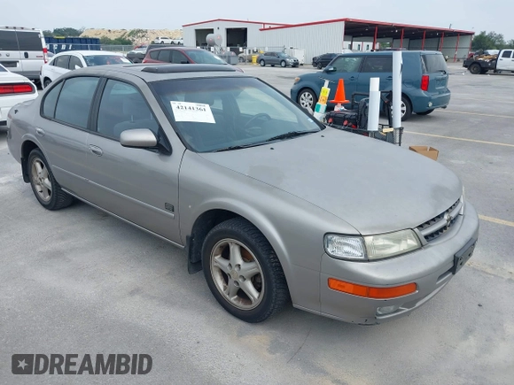 1999 Nissan Maxima GXE with VIN JN1CA21D6XT223369, listed as a IAAI auction lot 42141361 with 210,781 mi miles and . Bid and sale history available at DreamBid. Image 1.