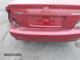 2002 Mazda Protege DX z VIN JM1BJ225821586258, wystawiony jako IAAI lot #42366064 z przebiegiem 167 332 mil mil oraz . Historia ofert i sprzedaży dostępna na DreamBid. Obrazek 6.