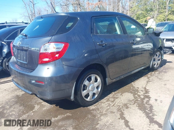 2009 Toyota Matrix with VIN 2T1KU40EX9C084721, listed as a IAAI auction lot 41748177 with 148,374 mi miles. Bid and sale history available at carsss.com. Image 4.