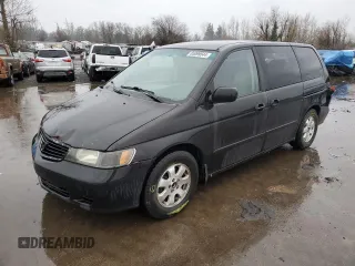 2000 Honda Odyssey LX z VIN 2HKRL1853YH580900, wystawiony jako Copart lot #52039865 z przebiegiem 205 194 mil mil oraz Szkoda całkowita • Salvage title. Historia ofert i sprzedaży dostępna na DreamBid. Obrazek 1.