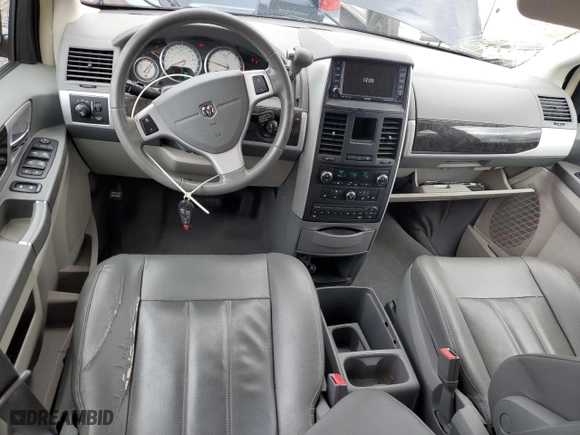 2010 Dodge Grand Caravan SXT with VIN 2D4RN5DX9AR223838, listed as a Copart auction lot 49289935 with 144,928 mi miles and Salvage Title. Bid and sale history available at carsss.com. Image 8.