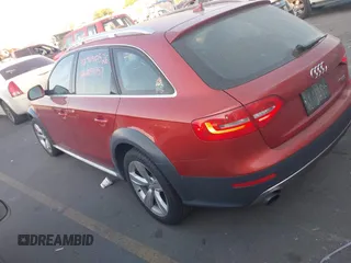 2014 Audi allroad Premium Plus with VIN WA1UFAFL1EA069928, listed as a IAAI auction lot 40558283 with 138,316 mi miles. Bid and sale history available at carsss.com. Image 3.