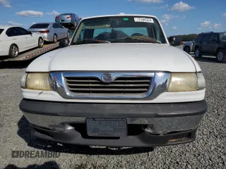 1999 Mazda B-Series 2WD Truck SX with VIN 4F4YR12C4XTM40289, listed as a Copart auction lot 77544354 with 192,046 mi miles and Salvage Title. Bid and sale history available at carsss.com. Image 5.