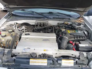 2005 Ford Escape Hybrid with VIN 1FMCU95H75KD90560, listed as a IAAI auction lot 42048840 with 137,223 mi miles. Bid and sale history available at carsss.com. Image 10.