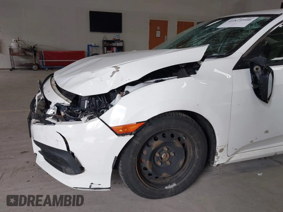 2016 Honda Civic Sedan LX with VIN 19XFC2F59GE028056, listed as a IAAI auction lot 41875940 with 124,243 mi miles. Bid and sale history available at carsss.com. Image 6.