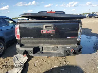 2015 GMC Canyon 4WD SLE with VIN 1GTH6BE33F1199189, listed as a Copart auction lot 87191114 with 199,477 mi miles and Salvage Title. Bid and sale history available at carsss.com. Image 6.