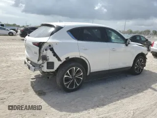 2023 Mazda CX-5 S Premium with VIN JM3KFBDM6P0146078, listed as a Copart auction lot 55654665 with 13,645 mi miles and Salvage Title. Bid and sale history available at DreamBid. Image 3.
