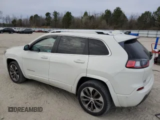 2019 Jeep Cherokee with VIN 1C4PJLJX3KD381640, listed as a Copart auction lot 42463593 with 28,310 mi miles and . Bid and sale history available at DreamBid. Image 2.