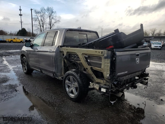 2021 Honda Ridgeline RTL-E with VIN 5FPYK3F74MB015036, listed as a Copart auction lot 43269105 with 64,631 mi miles and Salvage Title. Bid and sale history available at carsss.com. Image 2.