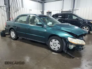 2002 Honda Accord LX z VIN 1HGCG16442A043585, wystawiony jako Copart lot #74481474 z przebiegiem 223 446 mil mil oraz Szkoda całkowita • Salvage title. Historia ofert i sprzedaży dostępna na DreamBid. Obrazek 4.