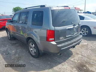 2009 Honda Pilot EX-L with VIN 5FNYF48569B050795, listed as a IAAI auction lot 42149732 with 281,504 mi miles. Bid and sale history available at carsss.com. Image 3.