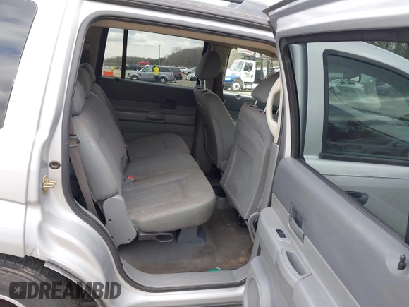 2005 Dodge Durango SXT with VIN 1D4HD38N95F506717, listed as a IAAI auction lot 41737887 with 272,149 mi miles and . Bid and sale history available at DreamBid. Image 8.